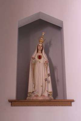 Immaculate Heart to the left of the Altar